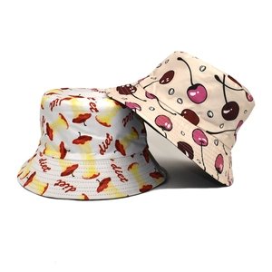 Women's cotton bucket hats featuring fruit patterns with apple and cherry prints