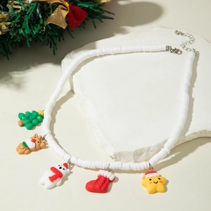 Detailed view of Christmas beaded necklace featuring Santa, reindeer, and tree charms