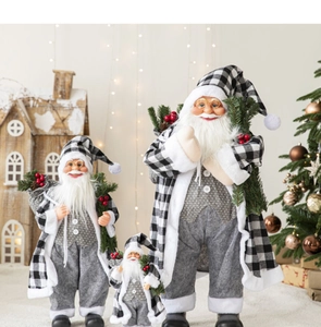 Detailed comparison of three sizes of Santa Claus dolls in black and white plaid outfits