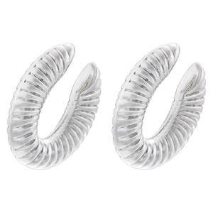 Macro view of silver C-shaped hoop earrings with detailed spiral textured pattern