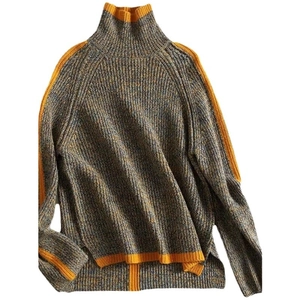 Loose knit turtleneck sweater with gray and yellow color-block design and side slits
