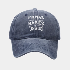 Macro detail of washed cotton baseball cap fabric and religious slogan print