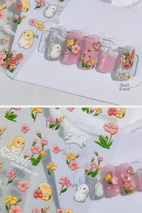 Detail of 3D embossed rabbit and flower nail art stickers with relief texture