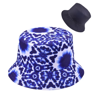 Detail of reversible blue tie-dye bucket hat with wide brim for sun protection