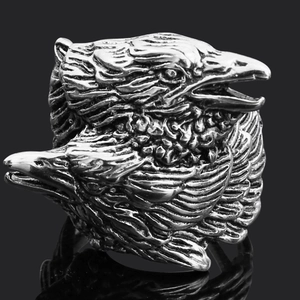 Macro shot of Viking wolf head ring featuring detailed Nordic rune textures and antique silver finish