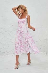 Detail of French vintage floral sundress showing side split and pink flower pattern