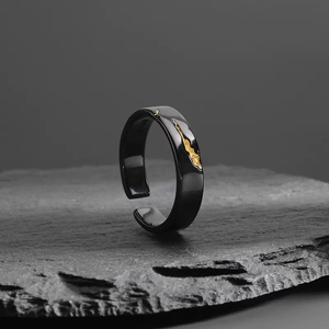 Creative black and gold textured open ring for men featuring an elegant business style