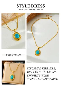 Macro shot of gold snake chain with oval blue turquoise pendant in vintage frame