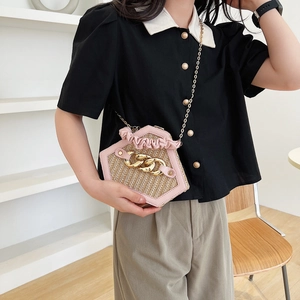 Pink and straw hexagonal shell bag with ruffled handle and chunky metal chain decoration
