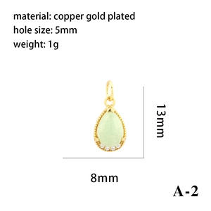Detail of 18K gold plated teardrop pendant with green stone and size specifications