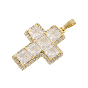 Gold cross pendant with square-cut clear zircons and pavé setting on white background