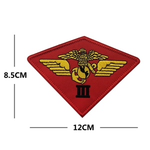 Detailed view of red and gold TOP GUN Maverick military embroidery patch measuring 12x8.5cm