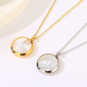 Gold and silver round shell pendant necklaces with stainless steel chains on white background