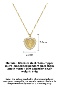 Detail view of gold heart St. Benedict pendant necklace with sparkling micro-pave zircons