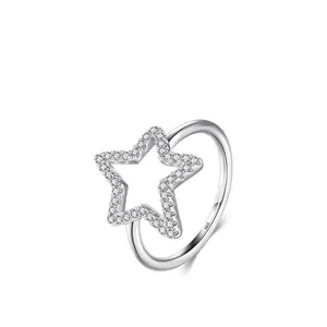 S925 sterling silver ring with micro-pave crystal open star design on white background