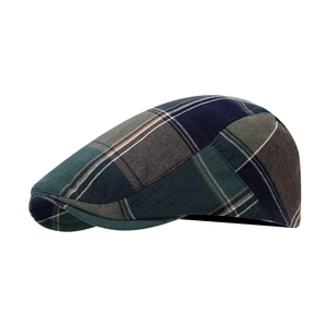 Classic plaid flat cap with navy and green check pattern on a clean white background