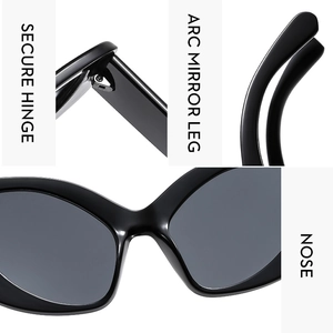 Detail of secure hinges, arc mirror legs and integrated nose pads on black sunglasses