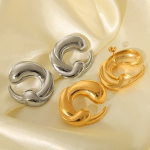 Chic chunky C-shape hoop earrings in gold and silver finish on silk fabric