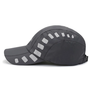 Dark grey quick-dry sports cap with breathable mesh side panels and long sun visor