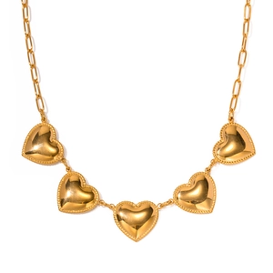 Golden heart pendant necklace with polished links and five hollow heart charms