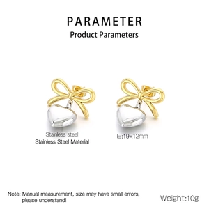 Detail view of two-tone bow heart earrings with dimensions 19x12mm in stainless steel