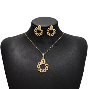 Golden vintage geometric necklace and earrings set with woven hollow wreath pattern