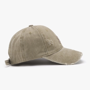Distressed cotton baseball cap with letter H embroidery and vintage washed finish