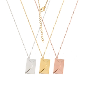 Minimalist stainless steel envelope pendant necklaces in silver, gold, and rose gold finishes
