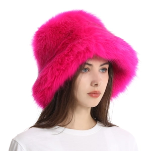 Close-up of thick hot pink faux fox fur texture on a warm winter bucket hat