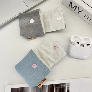 Mini denim earphone pouches in grey and blue with snap closure for small item storage
