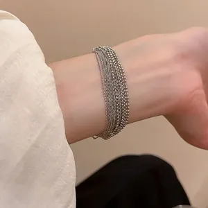 Minimalist multi-layer silver chain bracelet with beads and links for women's fashion