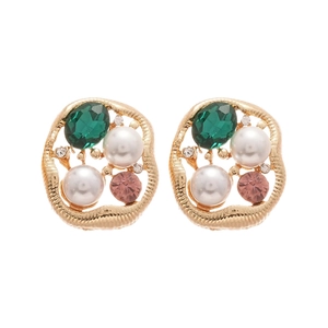 Vintage irregular gold earrings with green gemstones, pearls, and crystals on white background