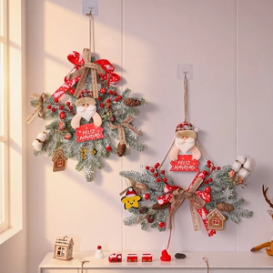 Snowflake-shaped Christmas wreath with Santa, red berries, and frosted pine needles