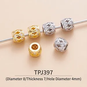 Macro detail of brass beads with zircon micro-pave in gold and silver, size 8x7x4mm