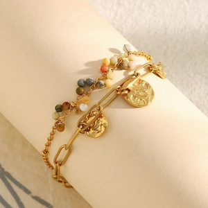 Detail of 18K gold-plated double-layer chain bracelet with coin pendant and colorful beads
