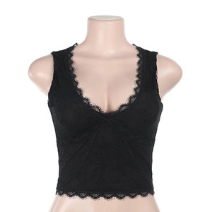 Detailed view of the V-neck lace trim and floral texture on the black cropped tank top