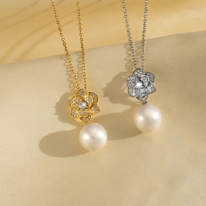 Gold and silver camellia flower necklaces with sparkling crystals and pearl pendants