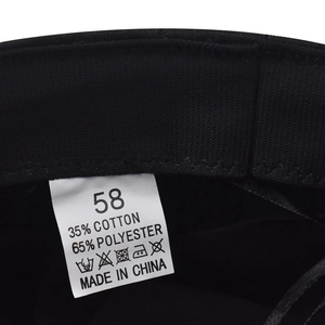 Detail of inner fabric label showing 35% cotton 65% polyester blend and size 58