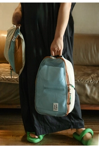 Detailed view of the breathable mesh travel organizer bag with a Free Travel logo label