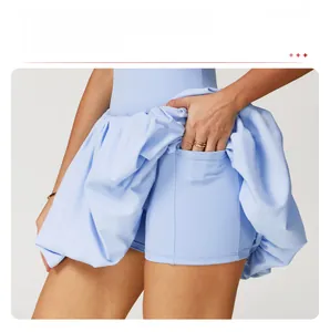 Detail of light blue tennis dress with built-in shorts and hidden side phone pocket