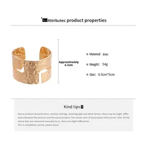 Detail view showing hammered gold metal texture and specifications of the wide cuff bracelet