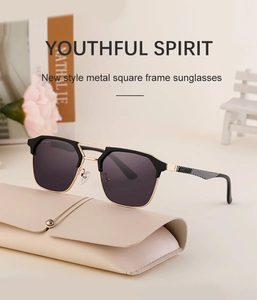 Detail of square metal sunglasses with checkered temple and beige leather glasses case