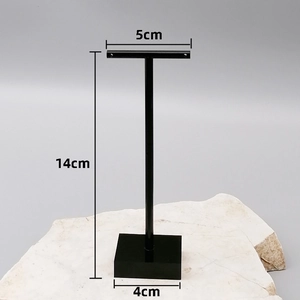 Black T-shaped acrylic earring stand with rectangular base measuring 14cm in height