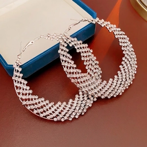 Silver mesh hoop earrings with sparkling rhinestones in a bold oversized circular design