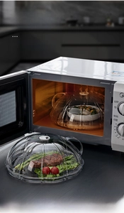 Macro detail of heat-resistant PC microwave cover showing clear finish and top handle