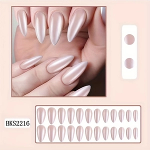 Detailed set of 24 pearlescent white long stiletto press-on nails with adhesive tabs