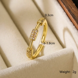 Detailed view of adjustable gold-plated ring with zircon inlays and dimensions