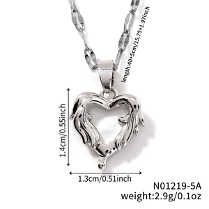 Detail view of silver heart pendant with dimensions 1.4cm by 1.3cm and 45cm chain length