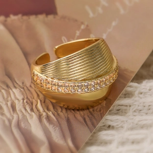 Vintage 18K gold plated ring with geometric stripes and pavé cubic zirconia accents