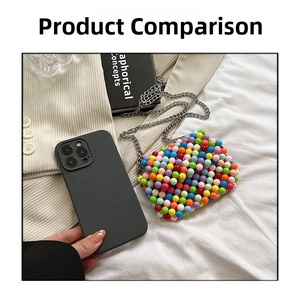 Mini multi-color beaded crossbody bag shown with a phone to demonstrate its compact size